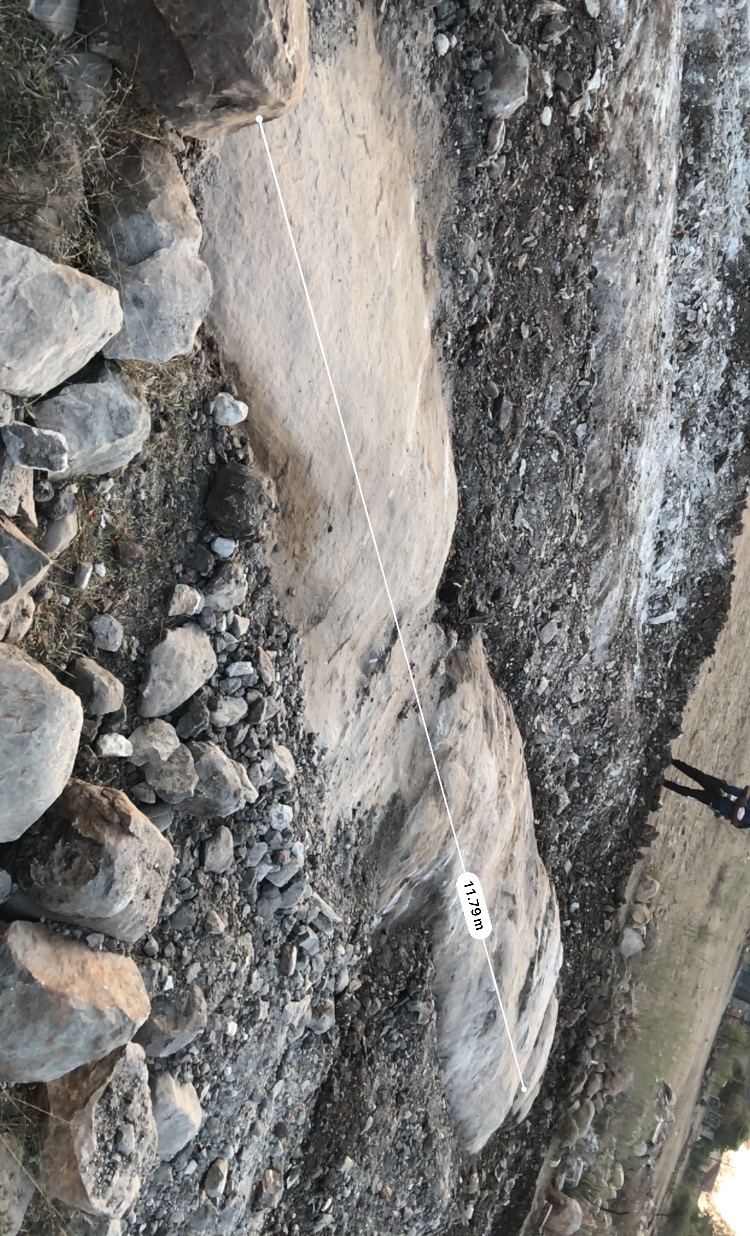 Massive underground boulders discovered during excavation - 11.79m measurement showing the scale of challenges